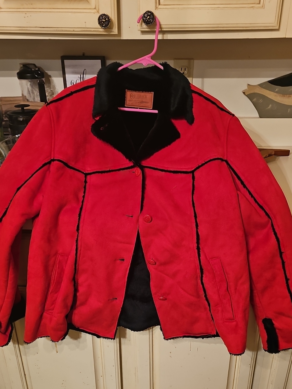 Red Faux Shearling Jacket with Black Trim by